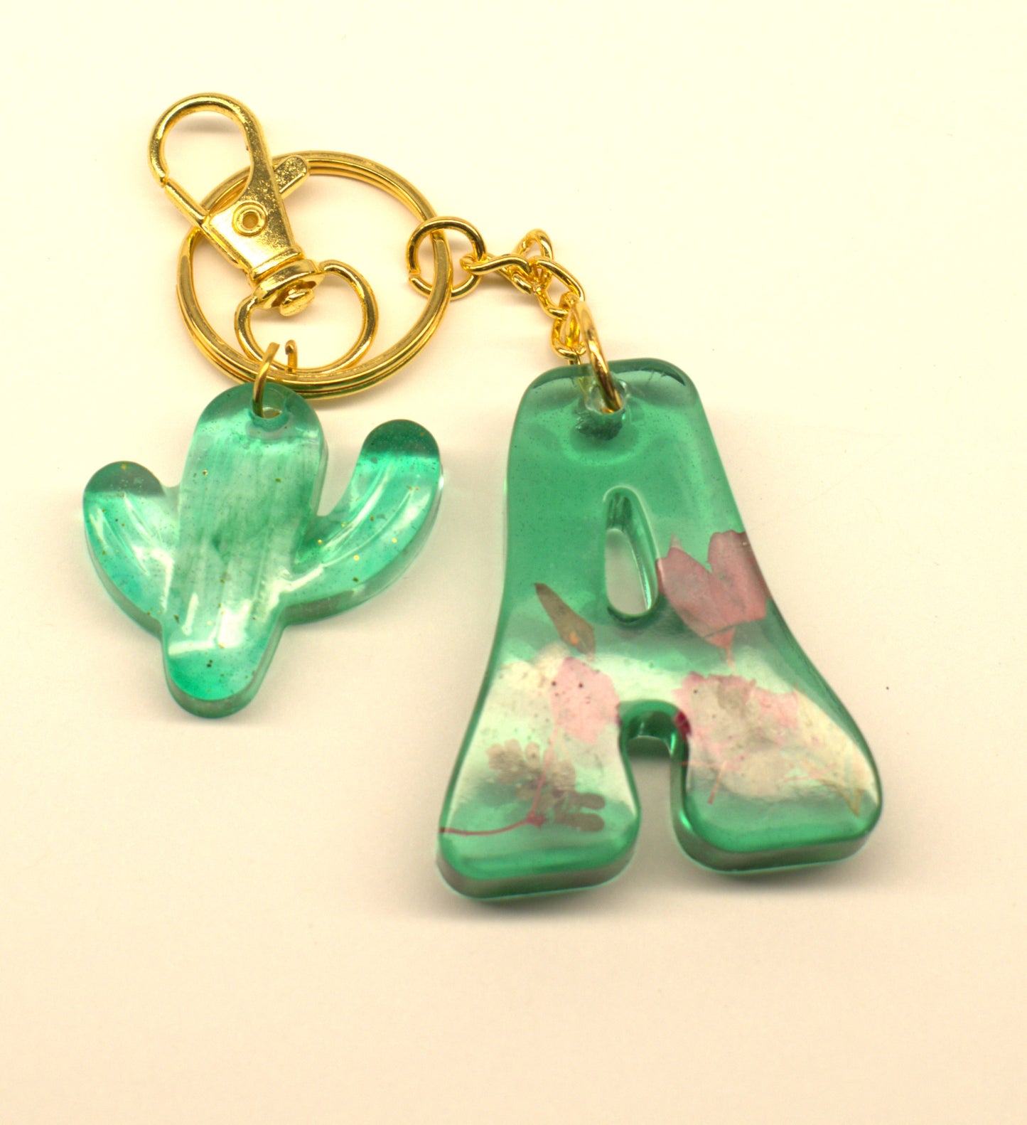 Transparent Green Epoxy Letter A Keychain with Dried Flowers