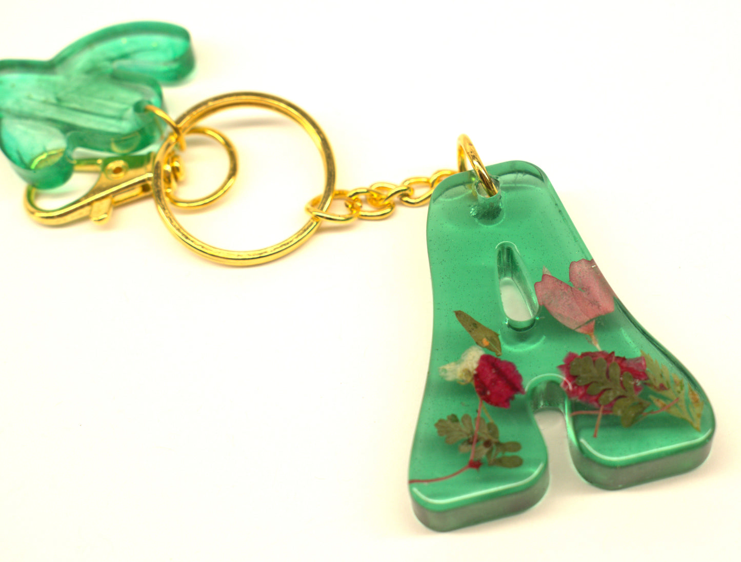 Transparent Green Epoxy Letter A Keychain with Dried Flowers